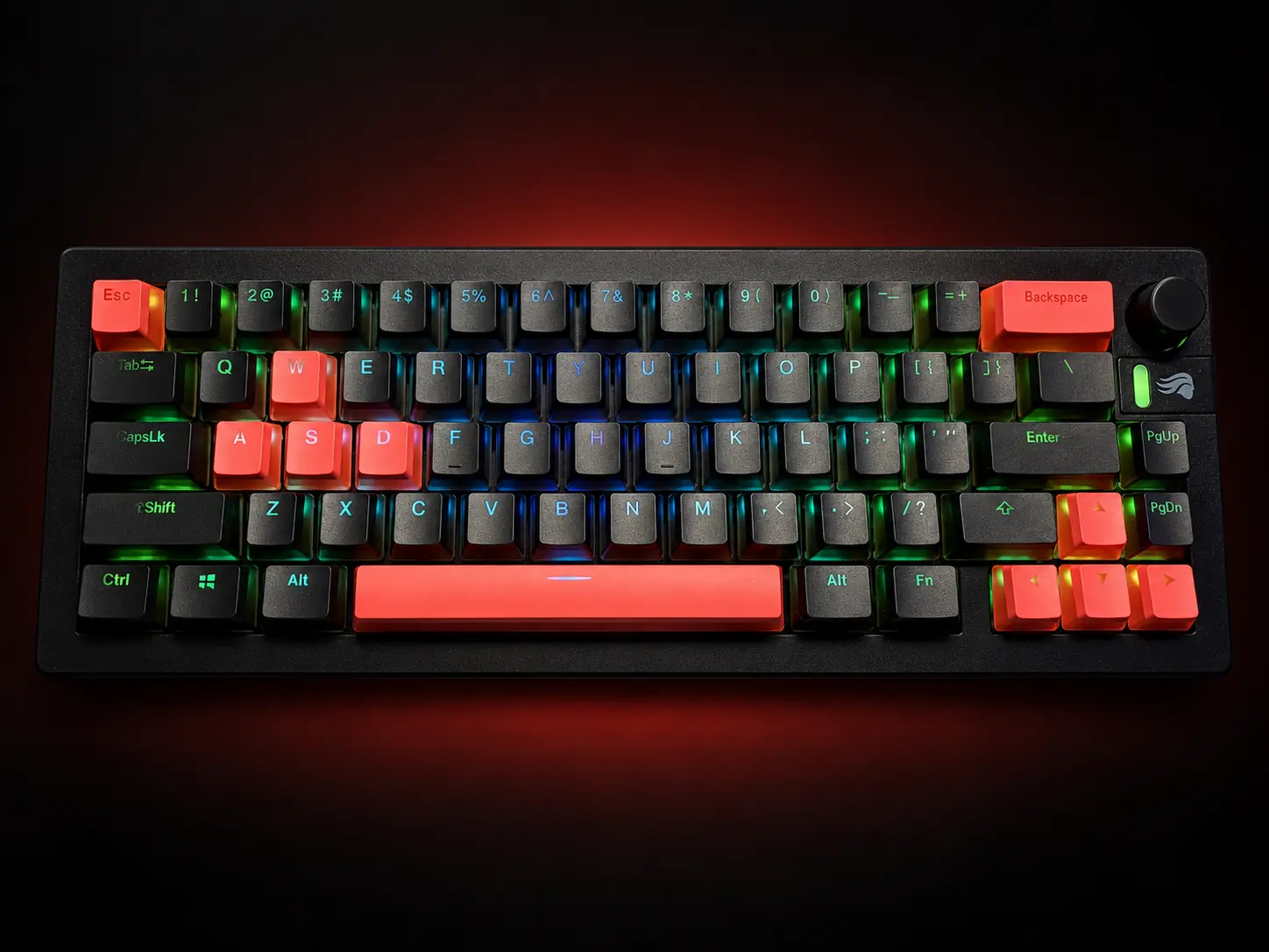 Centered top-down view of the finished black Inferno 65 keyboard with coral-red accent keycaps and rainbow RGB lighting on a charcoal-and-ember studio background